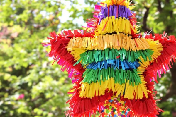 Colorful piñata in the shape of a star.