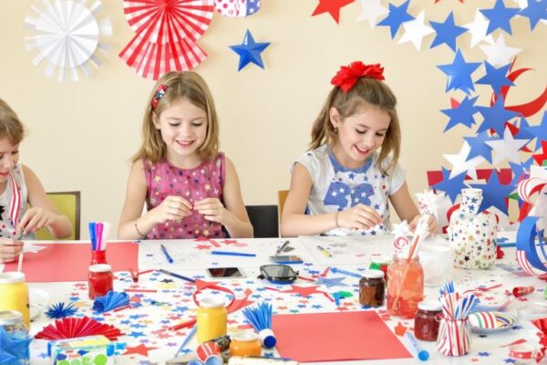 Kids making red, white, and blue Memorial Day crafts