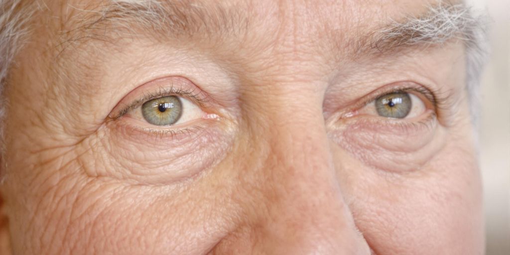 Older adult with bright eyes and gentle smile