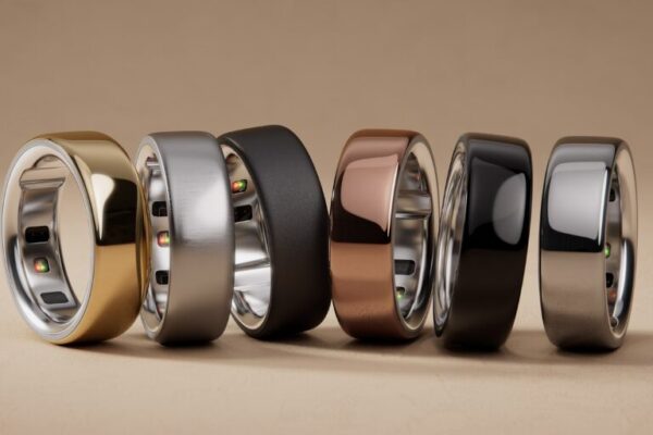 Smart rings lined up in different colors and finishes.